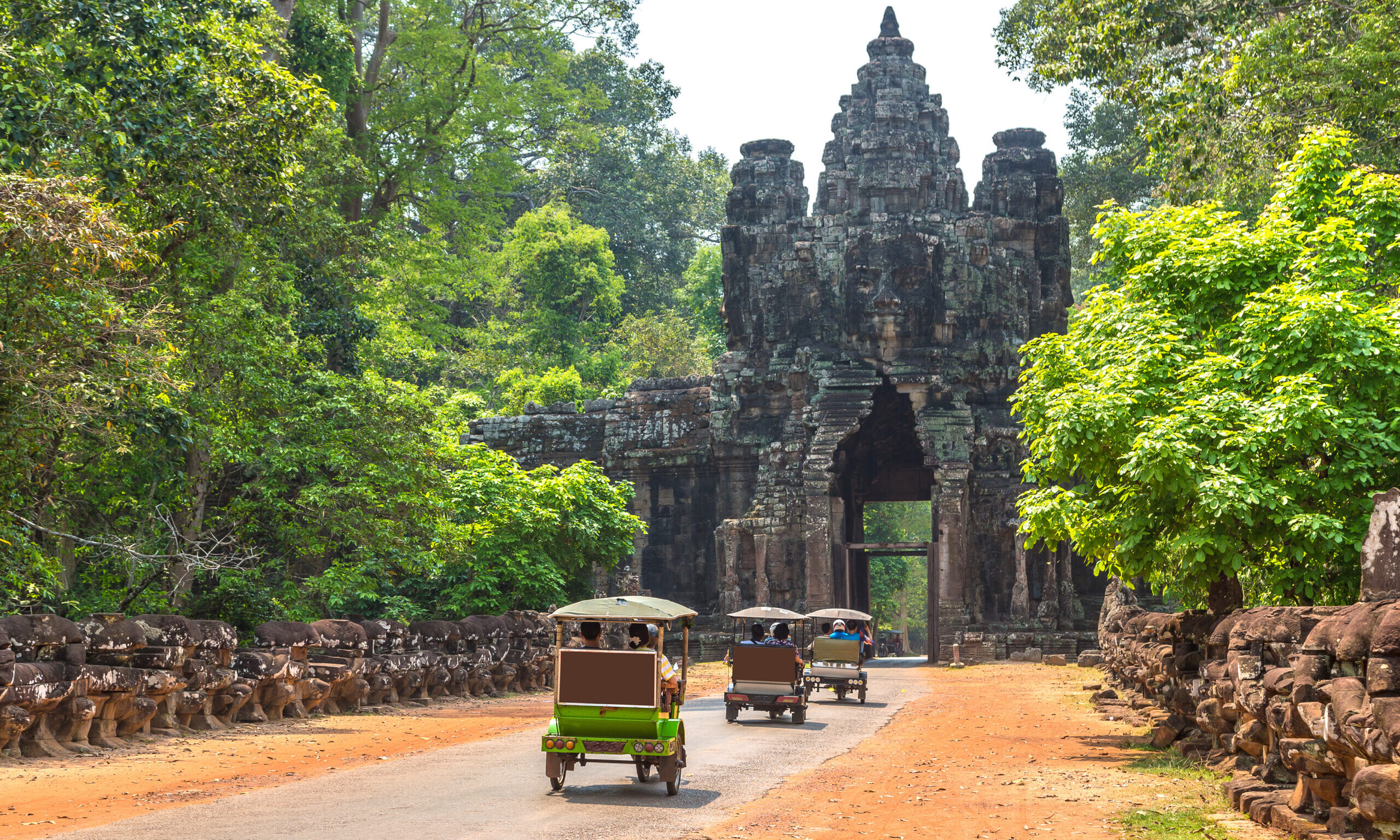 Traditional,Tuk,Tuk,On,A,Road,And,South,Gate,To