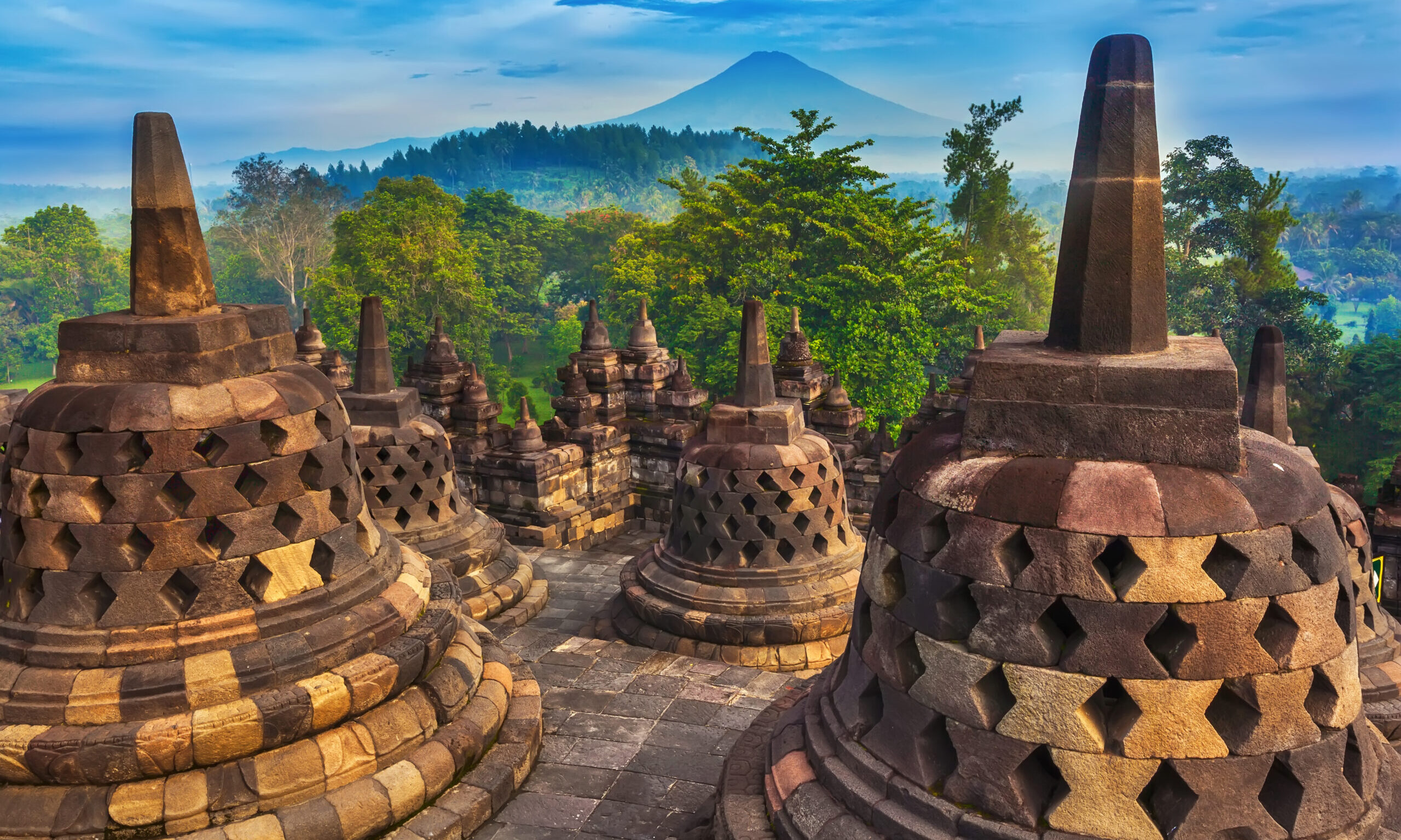 Candi,Borobudur,In,The,Background,Of,Rainforest,,Morning,Mist,And